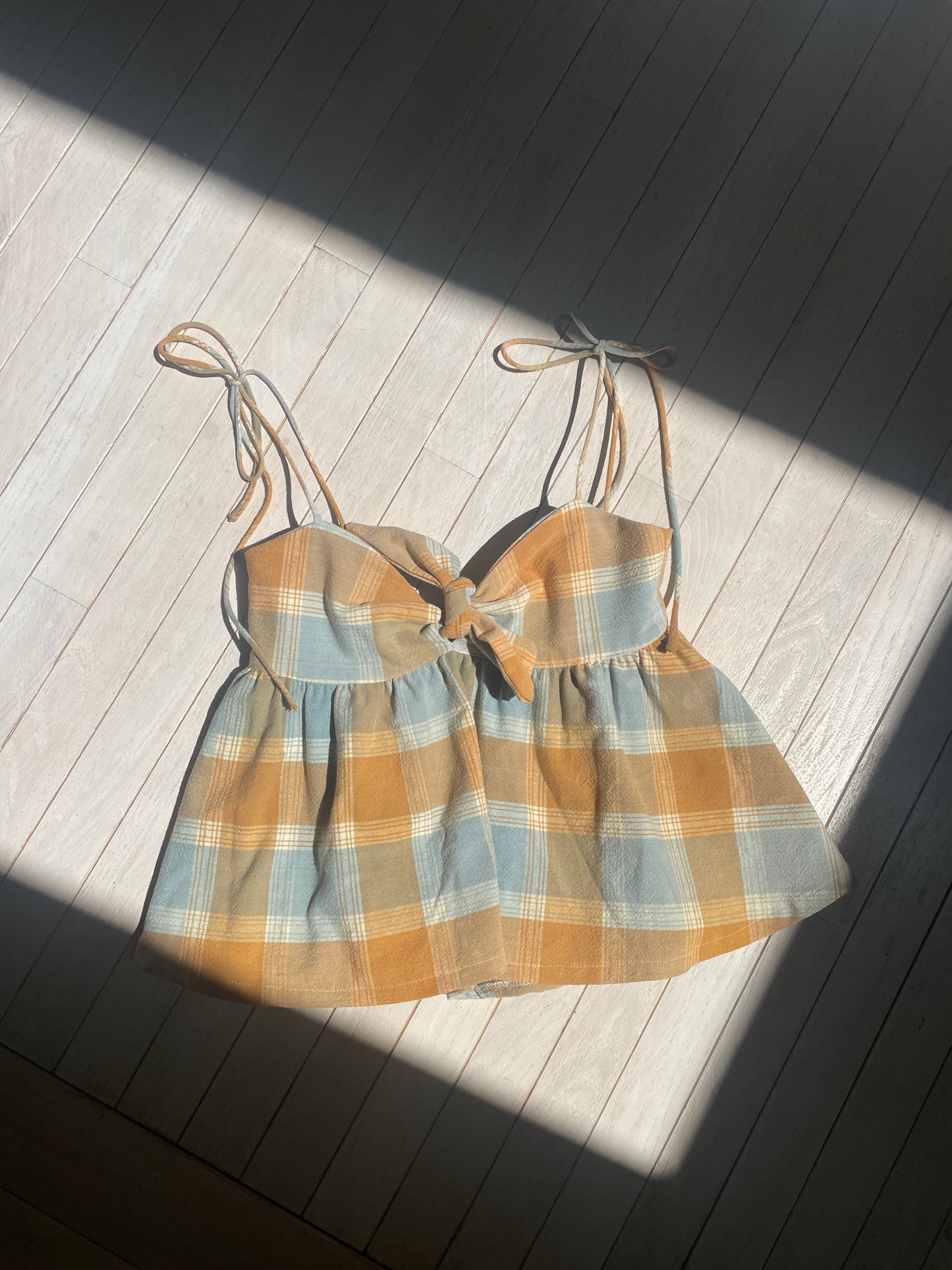 Orange plaid babydoll top