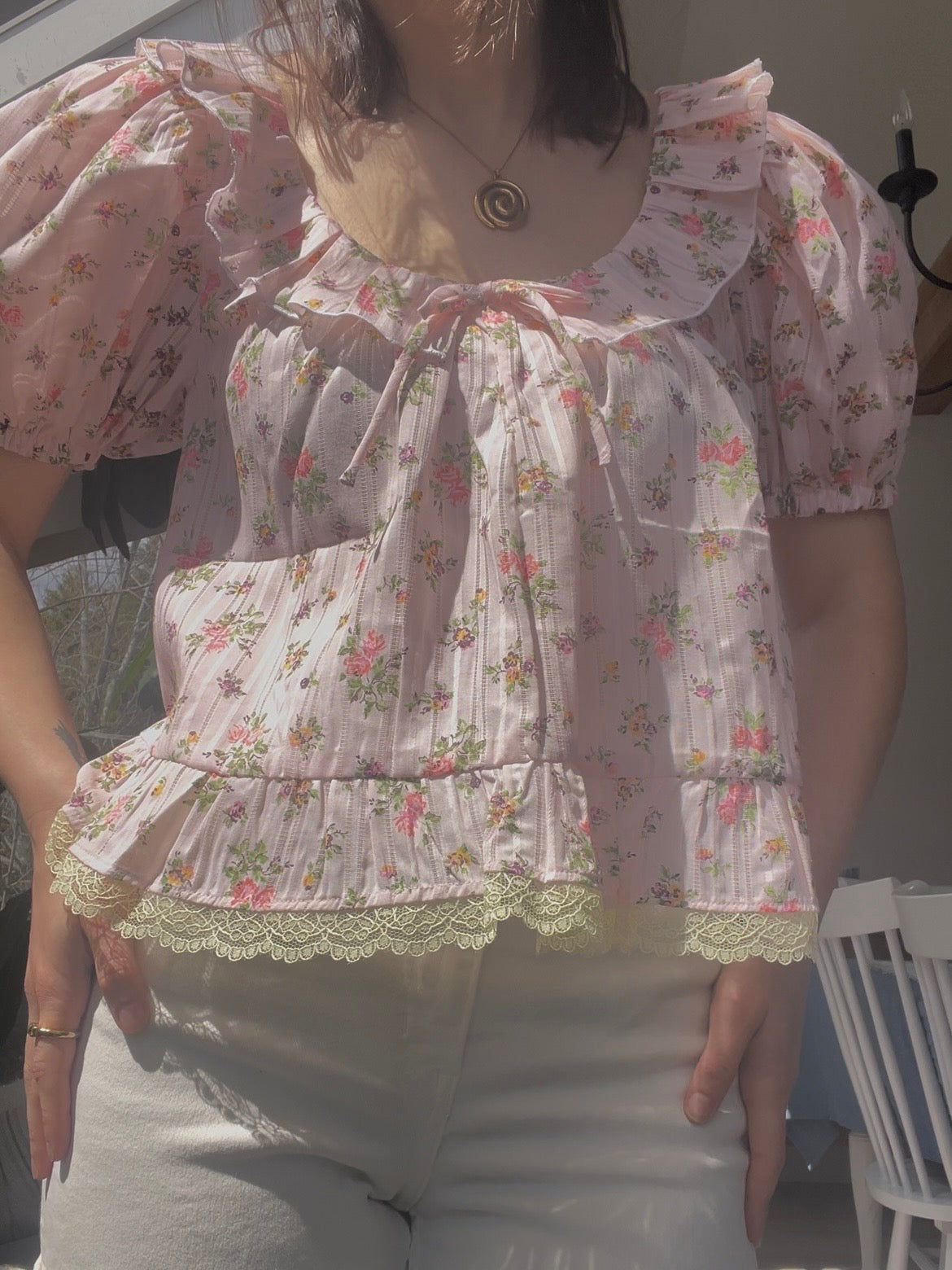 Pink floral blouse
