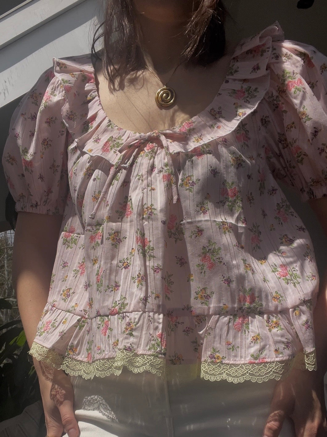 Pink floral blouse