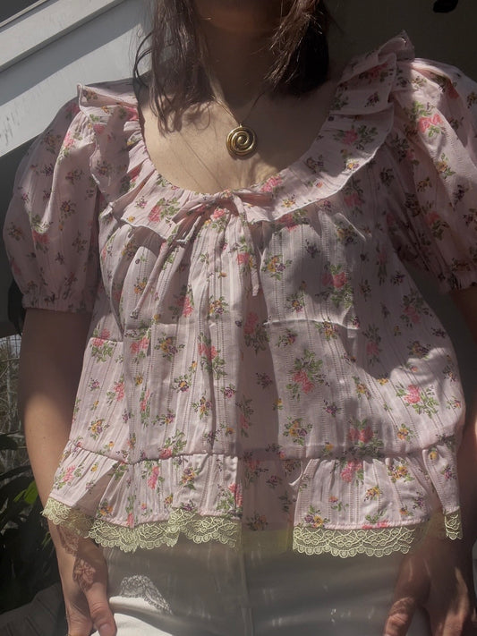 Pink floral blouse